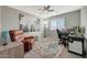 Home office featuring a desk, chair, and relaxing recliner at 1976 S 172Nd Ln, Goodyear, AZ 85338