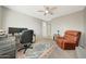 Home office with a comfortable recliner and workspace at 1976 S 172Nd Ln, Goodyear, AZ 85338