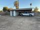 Backyard view showing detached garage and covered parking at 2045 W Colter St, Phoenix, AZ 85015