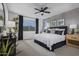 Spacious main bedroom with mountain views and a ceiling fan at 20631 N 226Th Ln, Surprise, AZ 85387