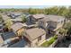 Aerial view of two-story house with landscaped yard and mountain views at 21150 W Prospector Way, Buckeye, AZ 85396