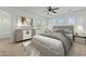 Relaxing main bedroom with a plush bed and large windows at 21150 W Prospector Way, Buckeye, AZ 85396