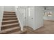 Carpeted staircase with a simple white railing leading to the upper level at 21150 W Prospector Way, Buckeye, AZ 85396