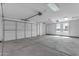 Spacious two-car garage with ample storage space at 24235 N 194Th Ave, Surprise, AZ 85387