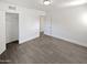 Well-lit bedroom with tile floors and a large closet at 309 E Weldon Ave, Phoenix, AZ 85012