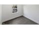 Bright bedroom with tile floors and a window offering natural light at 309 E Weldon Ave, Phoenix, AZ 85012