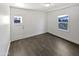 Cozy bedroom with tile floor and exterior access at 309 E Weldon Ave, Phoenix, AZ 85012