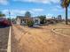 Updated home exterior with desert landscaping at 309 E Weldon Ave, Phoenix, AZ 85012