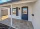 Quaint front porch entry with updated door and tile at 309 E Weldon Ave, Phoenix, AZ 85012