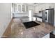 Modern kitchen featuring granite countertops and stainless steel appliances at 309 E Weldon Ave, Phoenix, AZ 85012