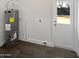 Laundry room with washer and dryer hookups and access to backyard at 309 E Weldon Ave, Phoenix, AZ 85012