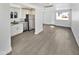 Spacious living room with an open concept design and kitchen access at 309 E Weldon Ave, Phoenix, AZ 85012