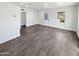 Spacious living area with gray tile flooring at 309 E Weldon Ave, Phoenix, AZ 85012