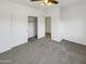 Bedroom with double door closet and carpet flooring at 3305 S 122Nd Ln, Tolleson, AZ 85353