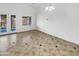 Dining room with tile flooring and access to patio at 3305 S 122Nd Ln, Tolleson, AZ 85353