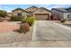 One-story house with a two-car garage and well-maintained landscaping at 3305 S 122Nd Ln, Tolleson, AZ 85353