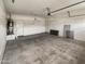 Spacious garage with ample storage space and additional door at 3305 S 122Nd Ln, Tolleson, AZ 85353