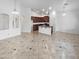 Kitchen with island and dark wood cabinets at 3305 S 122Nd Ln, Tolleson, AZ 85353