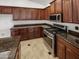 Modern kitchen with stainless steel appliances and granite countertops at 3305 S 122Nd Ln, Tolleson, AZ 85353