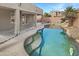 Inviting kidney shaped pool with flagstone decking at 3305 S 122Nd Ln, Tolleson, AZ 85353