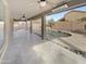 Covered patio overlooking a sparkling pool and backyard at 3305 S 122Nd Ln, Tolleson, AZ 85353