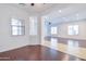 Dining area with hardwood floors and access to the living room at 3499 E Shannon St, Gilbert, AZ 85295