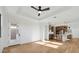 Open concept space with a kitchen, recessed lighting, and a ceiling fan at 4380 N 203Rd Dr, Buckeye, AZ 85396