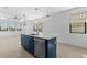 Open kitchen and dining area with modern appliances and lots of natural light at 4419 N 203Rd Ave, Buckeye, AZ 85396