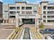 The Luxe 5250 building entrance with water feature at 5250 E Deer Valley Dr # 450, Phoenix, AZ 85054