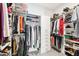 Large walk-in closet with ample shelving and hanging space at 5250 E Deer Valley Dr # 450, Phoenix, AZ 85054