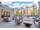 Relaxing outdoor patio with seating areas and fire pit at 5250 E Deer Valley Dr # 450, Phoenix, AZ 85054