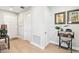 Bright and airy entryway with light wood floors and stylish decor at 5250 E Deer Valley Dr # 450, Phoenix, AZ 85054