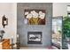 Modern fireplace with a unique art piece above it at 5250 E Deer Valley Dr # 450, Phoenix, AZ 85054