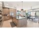 Modern kitchen with large island, stainless steel appliances, and ample cabinetry at 5250 E Deer Valley Dr # 450, Phoenix, AZ 85054
