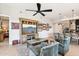 Open living and kitchen area with large windows and wood floors at 5250 E Deer Valley Dr # 450, Phoenix, AZ 85054