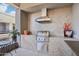 Outdoor kitchen with grill, cabinetry, and herringbone tile at 5250 E Deer Valley Dr # 450, Phoenix, AZ 85054
