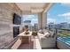 Outdoor patio with fireplace and comfortable seating at 5250 E Deer Valley Dr # 450, Phoenix, AZ 85054