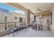 Outdoor patio with built-in grill, dining area, and city views at 5250 E Deer Valley Dr # 450, Phoenix, AZ 85054