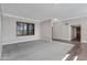 Light and airy living room with hardwood floors and window shutters at 6426 S Rockford Dr, Tempe, AZ 85283