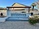 Attractive community entrance sign that reads Martinique with stone accents and wood beam accents at 659 S Dodge St, Gilbert, AZ 85233