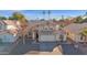 Traditional home with a well-kept front yard, desert landscaping, and a welcoming entrance for curb appeal at 659 S Dodge St, Gilbert, AZ 85233