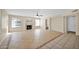 Spacious living room with tile flooring, fireplace, neutral walls, and plentiful natural light from large windows at 659 S Dodge St, Gilbert, AZ 85233