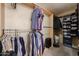 Walk-in closet with custom shelving and hanging space at 8749 E Willetta St, Scottsdale, AZ 85257