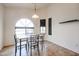 Small dining area with table and four chairs at 8749 E Willetta St, Scottsdale, AZ 85257