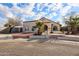 Single-story home with brick driveway and desert landscaping at 8749 E Willetta St, Scottsdale, AZ 85257