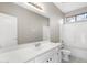 Clean bathroom with white vanity and bathtub at 8903 N 57Th Dr, Glendale, AZ 85302