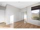 Light and airy bedroom with mirrored closet doors at 8903 N 57Th Dr, Glendale, AZ 85302