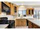 Kitchen features a gas range and ample counter space at 8903 N 57Th Dr, Glendale, AZ 85302