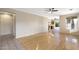 Spacious living area with hardwood floors and kitchen view at 8903 N 57Th Dr, Glendale, AZ 85302