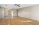Bright living room with hardwood floors and ceiling fan at 8903 N 57Th Dr, Glendale, AZ 85302